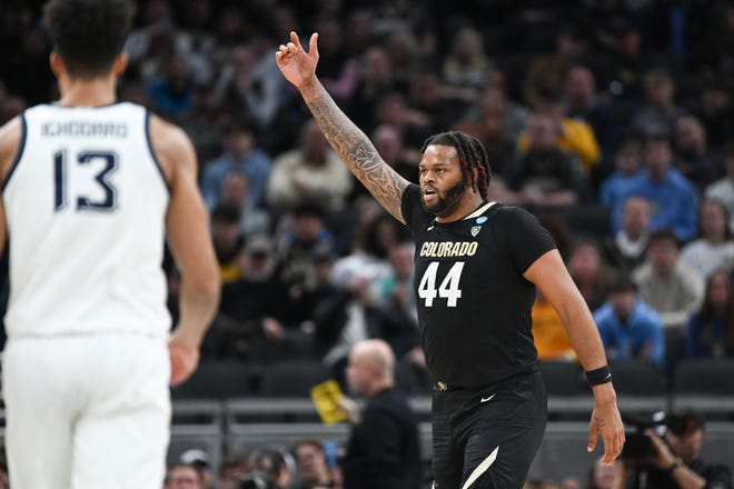 Mar 24, 2024; Indianapolis, IN, USA; Colorado Buffaloes center Eddie Lampkin Jr. (44) reacts after scoring against the Marquette Golden Eagles during the first half at Gainbridge FieldHouse. Mandatory Credit: Robert Goddin-USA TODAY Sports