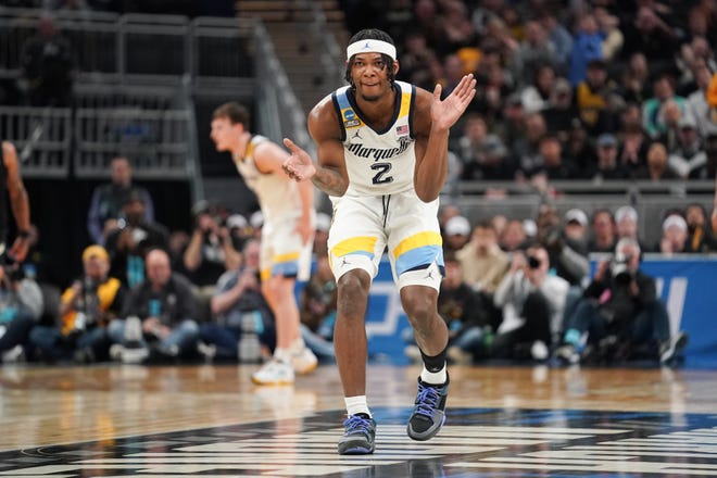 Marquette Golden Eagles guard Chase Ross (2) gestures during the second half against the Colorado Buffaloes at Gainbridge FieldHouse in the second round of the NCAA Tournament.