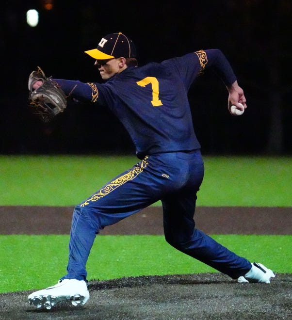 Pius XI pitcher Zachary Denneau (7) winds up during the game against Waukesha South at Frame Park in Waukesha, Thursday, March 28, 2024.