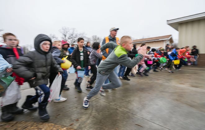 Youngsters race off the starting line for the annual Okauchee Lions Easter Egg Hunt at Lions Park on Saturday, March 30, 2024. The free family event, hosted by the Okauchee Lions Club, features several egg hunts for various age groups.