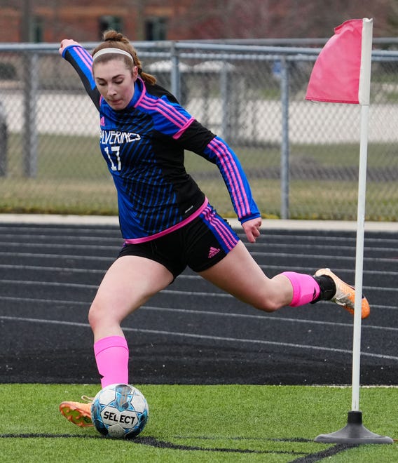 Waukesha West's Brynna Panlener (17) takes a corner kick during the match at home against Kettle Moraine Lutheran on Saturday, March 30, 2024.