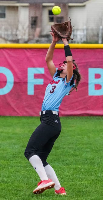 Arrowhead's Molly Boerst (3) pulls in a fly ball during the game at home against Oconomowoc, Tuesday, April 16, 2024.