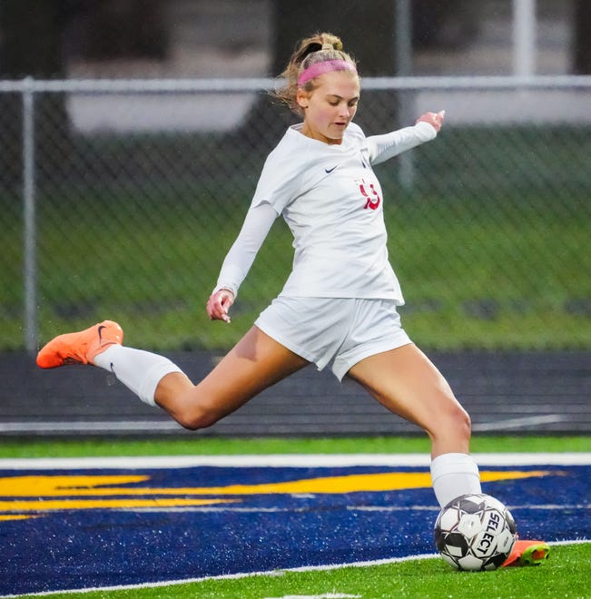 Brookfield East's Ella Schroeder (13) sends the ball downfield during the match at Kettle Moraine, Thursday, April 18, 2024.
