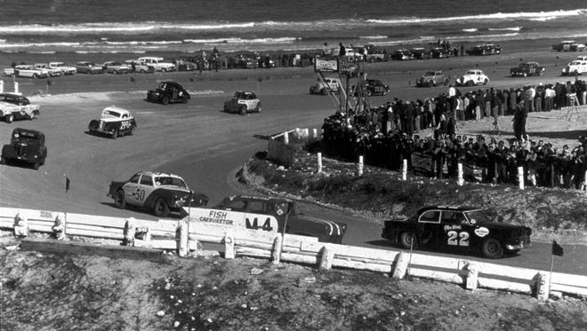 Pre-Daytona 500: One year before the first Daytona 500, Glen Wood (22) leads Banjo Matthews (M-4) in a 1958 Modified Sportsman race in Daytona Beach, Fla.