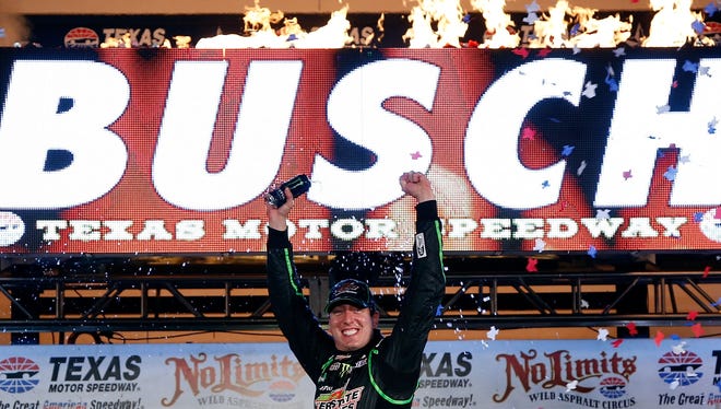 FORT WORTH, TX - APRIL 13:  Kyle Busch, driver of the #18 Interstate Batteries Toyota, celebrates in Victory Lane after winning the NASCAR Sprint Cup Series NRA 500 at Texas Motor Speedway on April 13, 2013 in Fort Worth, Texas.  (Photo by Chris Graythen/Getty Images for Texs Motor Speedway) ORG XMIT: 159332236 ORIG FILE ID: 166545041