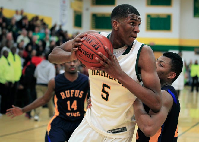 Kevon Looney played in the state tournament as a freshman in 2011 with Milwaukee Hamilton. Looney, seen here as a senior, scored 11 points in the Wildcats' 55-45 loss to Madison Memorial. Looney is a three-time NBA champion with the Golden State Warriors.