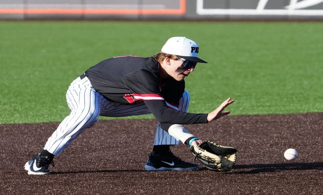 Pewaukee shortstop Drew Van Domelen (8) scoops up a ground ball during the game against Oconomowoc at Dockhounds Stadium in Oconomowoc, Wednesday, April 24, 2024.